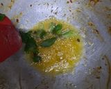 A picture of step 2 of Khattay aloo.