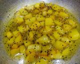 A picture of step 5 of Bengali Aloo Posto.