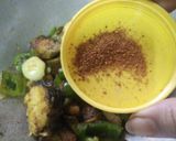 A picture of step 4 of Chettinad fish fry with veggie.