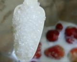 A picture of step 2 of Strawberry shake.