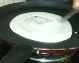 A picture of step 10 of Instant suji masala dosa.