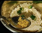 A picture of step 2 of Authentic Rickwach with Urad Dal and Colocasia leaves.