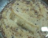 A picture of step 11 of Peanut Butter French Toast Roll-Ups With Banana & Almond Filling.
