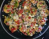 A picture of step 3 of Biscuit pizza.
