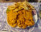 Foto del paso 4 de la receta: Filetes de pollo empanados con patatas al horno