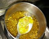 A picture of step 1 of Raisin and Fenugreek Seed Curry.