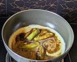 A picture of step 7 of Dudh Potol (Pointed gourd cooked in a milk gravy).