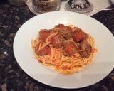 A picture of step 4 of Tuscan meatballs with spaghetti.