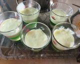 A picture of step 3 of Pista custard with banana jelly & plum jam.