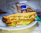 A picture of step 8 of Egg-veg mayo sandwich.