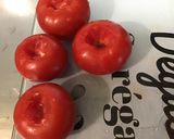 Une image de l'étape 4 de Côtes de porc aux tomates, ail rose et fanes de navets.