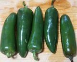 A picture of step 1 of Tuna-Stuffed Jalapeño Peppers.