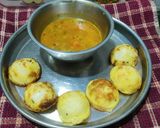 A picture of step 3 of Stuffed Masala Appam from leftover dosa better.