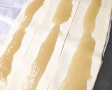 Foto del paso 2 de la receta: Caracolas hojaldradas de crema de almendra