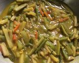 A picture of step 6 of Lentil Fritters in mix veg curry.