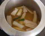 A picture of step 2 of Mulo Diye Mug Dal.