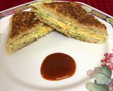 A picture of step 4 of Omelette Cheese Toasted Sandwich.