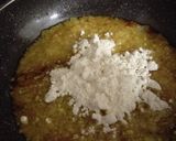 Foto del paso 4 de la receta Calabacín relleno de zanahorias y nueces con arroz salteado con pasas y caqui