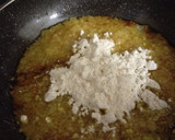 Foto del paso 4 de la receta: Calabacín relleno de zanahorias y nueces con arroz salteado con pasas y caqui