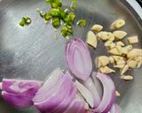 A picture of step 1 of Spinach and corn curry with garlic tempering.
