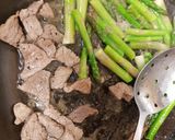 A picture of step 2 of Beef Strips & Asparagus cooked in Garlic Butter.