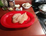 A picture of step 1 of Pan Seared Chicken with Mushroom & Herb Sauce.
