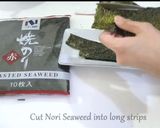 A picture of step 6 of Salmon Onigiri.