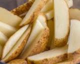 A picture of step 1 of Baked wedges #4week challenge.