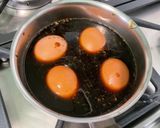 Une image de l'étape 5 de Œufs marinés aux oignons nouveaux.