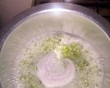 A picture of step 1 of Minji stew served with white rice.
