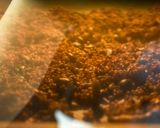 A picture of step 8 of Gluten-Free Puffed Quinoa Granola with Almonds and Plums.