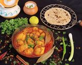 A picture of step 6 of Stuffed Potato Curry (garam masala).