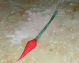 A picture of step 6 of Valentines day special fondant red rose cake topper.