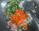 A picture of step 2 of Chicken cheese white sauce farfalle pasta.