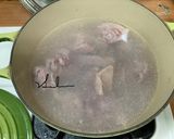 A picture of step 2 of Chicken Soup with Pickled Chili Peppers and Winter Melon.