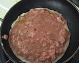 Foto langkah ke 5 dari resep Menu Sarapan - Roti isi Kornet dan Telur.
