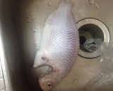 Hình bước làm 4 của món Canh dưa chua cá diêu hồng - ăn kèm rau sống