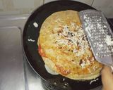 A picture of step 9 of Sandwich pizza from leftover Roti.