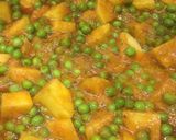 A picture of step 12 of Alu matar gravy.