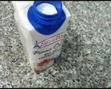 A picture of step 1 of Quick and easy Panna cotta with ruspberry.