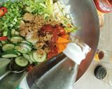 A picture of step 3 of Spicy cabbage, carrot and cucumber pickle.