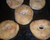 A picture of step 9 of Eggless Baked Colored Doughnut.