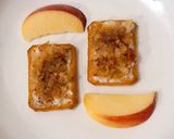 A picture of step 3 of Tuc with grated apple 🍏 🍎🍏🍎.