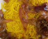 A picture of step 6 of Tumeric pasta with onion sauce.