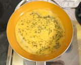 A picture of step 3 of Scrambled Eggs on Toast.
