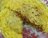 A picture of step 8 of Malaysian net crepes with Indian stuffed chicken.