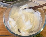 A picture of step 1 of Tzatziki (yoghurt and cucumber dip).