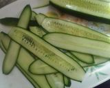 A picture of step 2 of 1 bite cucumber 🥒 salad.