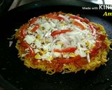 A picture of step 4 of Maggi pizza.