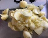 Une image de l'étape 2 de Courgettes rondes en cocotte farcies chair à saucisse et épices.